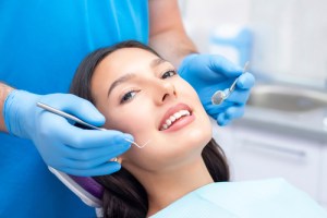 woman smiling in exam chair